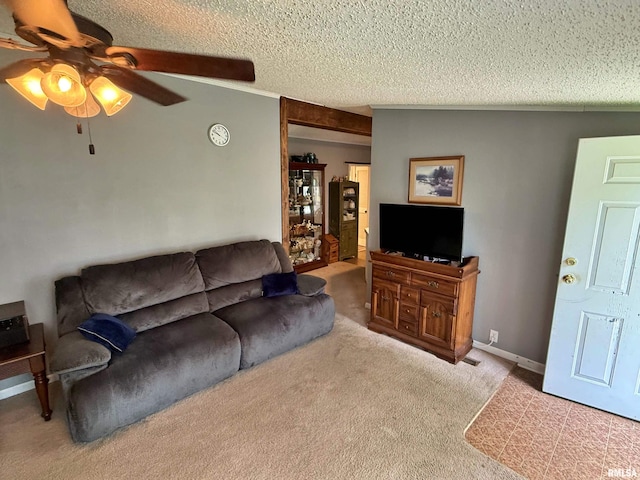 2000 Simmons St, Metropolis, IL 62960 - living area with a ceiling fan, carpet, a textured ceiling, and baseboards