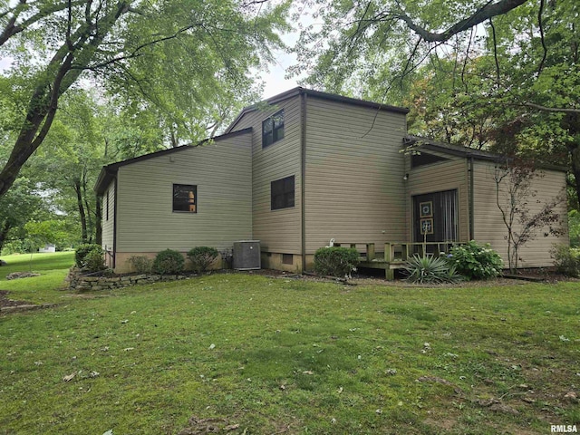 2998 Massac Creek Rd, Metropolis, IL 62960 - rear view of property featuring a lawn, a wooden deck, and crawl space