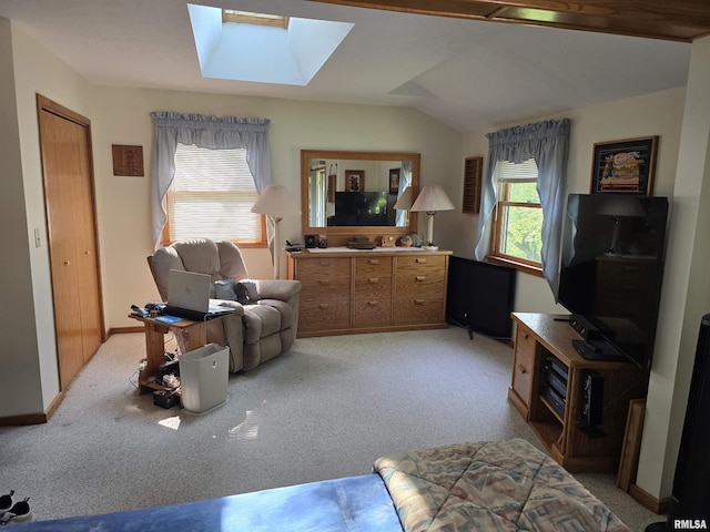 2998 Massac Creek Rd, Metropolis, IL 62960 - living room featuring a skylight, light colored carpet, and lofted ceiling