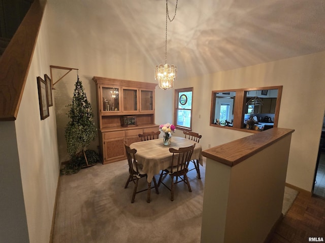2998 Massac Creek Rd, Metropolis, IL 62960 - dining space featuring a chandelier and a high ceiling