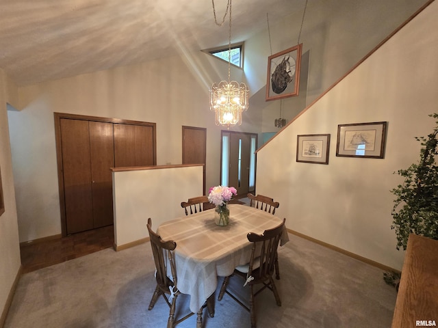 2998 Massac Creek Rd, Metropolis, IL 62960 - dining room featuring carpet flooring, a chandelier, and high vaulted ceiling