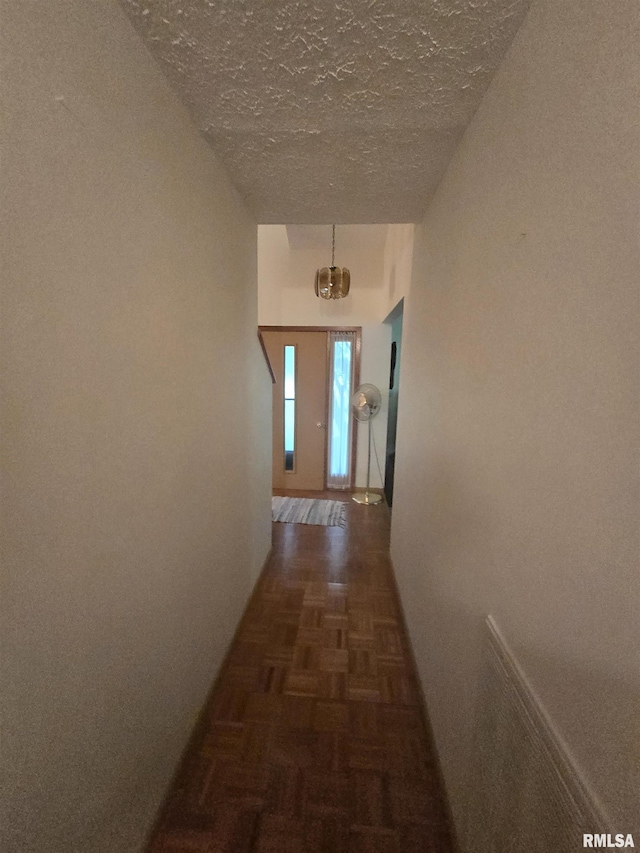 2998 Massac Creek Rd, Metropolis, IL 62960 - hall featuring a textured ceiling and a chandelier