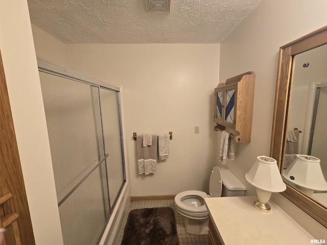 2998 Massac Creek Rd, Metropolis, IL 62960 - full bath with tile patterned flooring, vanity, a textured ceiling, and enclosed tub / shower combo