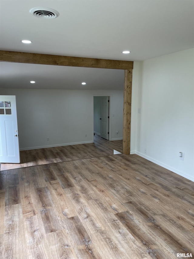 208 Dorris Dr, Metropolis, IL 62960 - spare room featuring wood finished floors, recessed lighting, and baseboards
