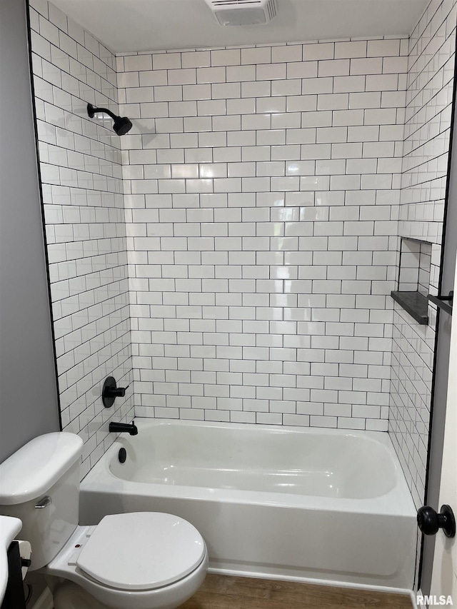 208 Dorris Dr, Metropolis, IL 62960 - bathroom with toilet and shower / washtub combination