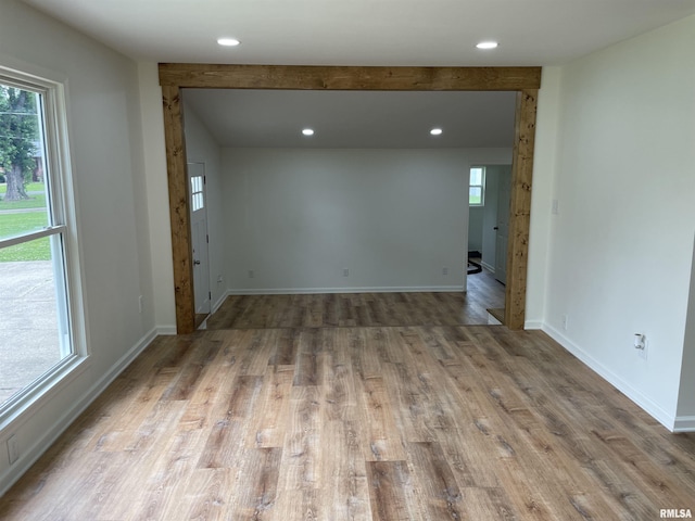 208 Dorris Dr, Metropolis, IL 62960 - unfurnished room with wood finished floors, recessed lighting, healthy amount of natural light, and baseboards