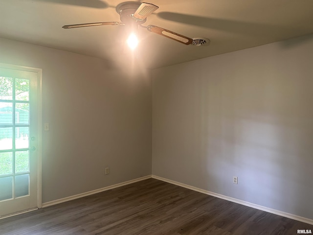 1008 N Norwest Ln, Carbondale, IL 62901 - empty room with ceiling fan, dark wood-type flooring, and baseboards
