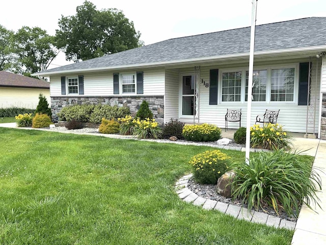 118 W 5th St, Hoffman, IL 62250 - ranch-style house with a front lawn, a porch, stone siding, and a shingled roof