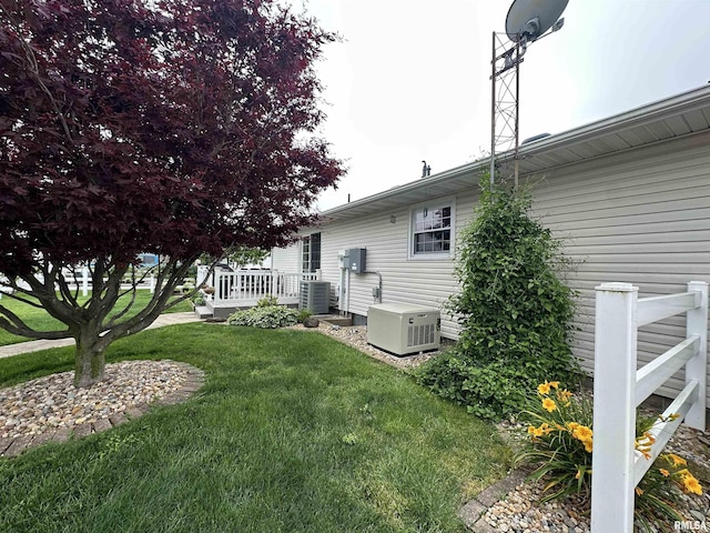 118 W 5th St, Hoffman, IL 62250 - view of grassy yard featuring central AC