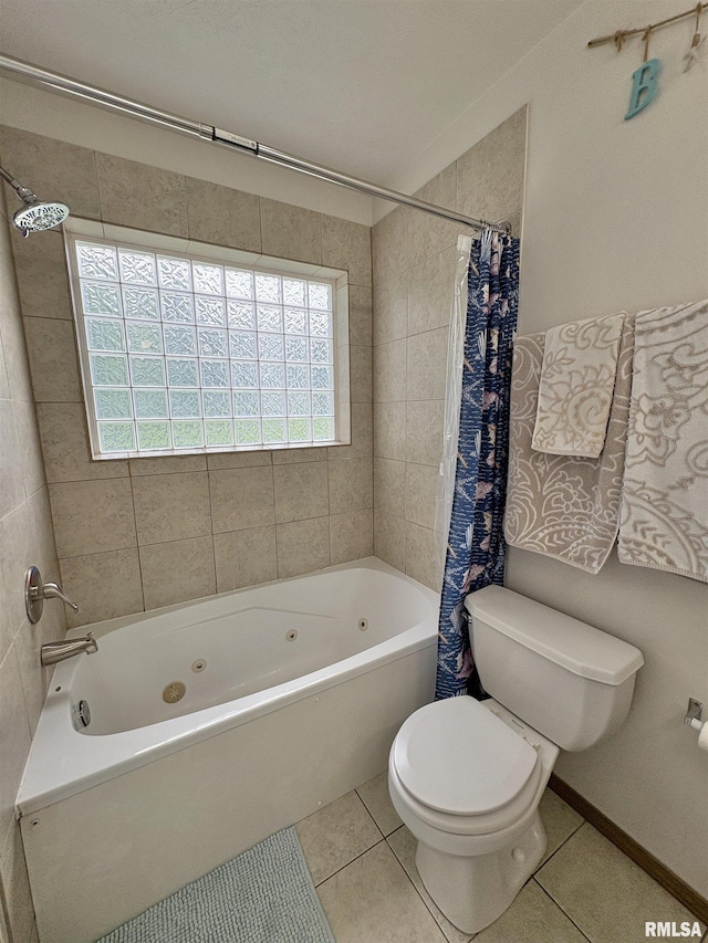 112 Townhouse Dr, Carterville, IL 62918 - full bath featuring a combined bath / shower with jetted tub, toilet, and tile patterned flooring