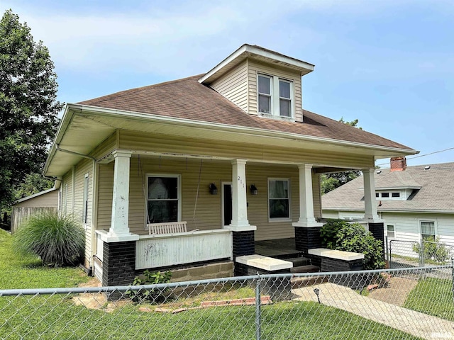 211 E Cross St, Dongola, IL 62926 - view of front of property featuring a porch and roof with shingles