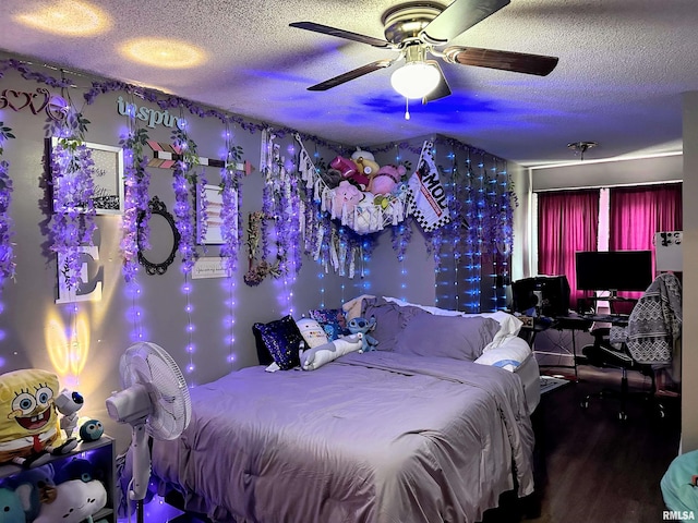 211 E Cross St, Dongola, IL 62926 - bedroom with a textured ceiling, wood finished floors, and a ceiling fan