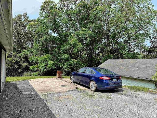 211 E Cross St, Dongola, IL 62926 - view of parking with view of wooded area