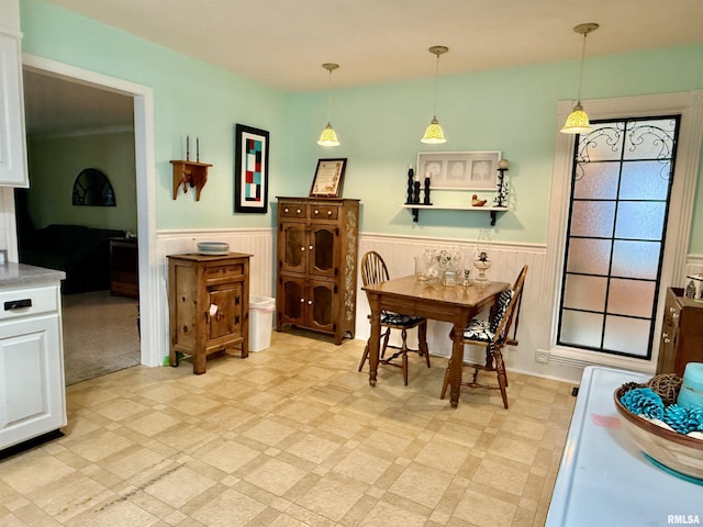 2016 Greenview St, Metropolis, IL 62960 - dining area featuring a wainscoted wall and light floors