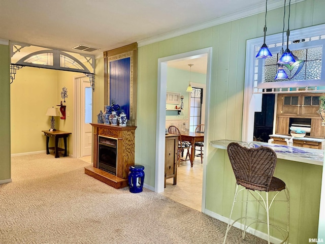 2016 Greenview St, Metropolis, IL 62960 - living room with a fireplace with raised hearth, carpet, crown molding, and baseboards