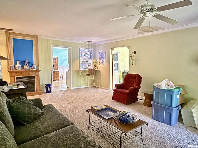 2016 Greenview St, Metropolis, IL 62960 - living area with ornamental molding, carpet flooring, a ceiling fan, a fireplace with raised hearth, and baseboards