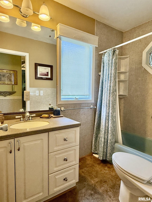 2016 Greenview St, Metropolis, IL 62960 - full bathroom with vanity, shower / bath combo, and toilet