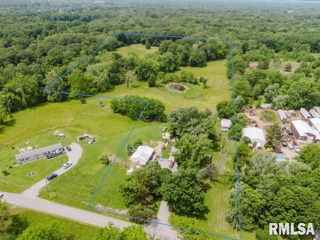 2601 Nielson Crossing Rd, Marion, IL 62959 - aerial overview of property's location with property parcel outlined and a heavily wooded area
