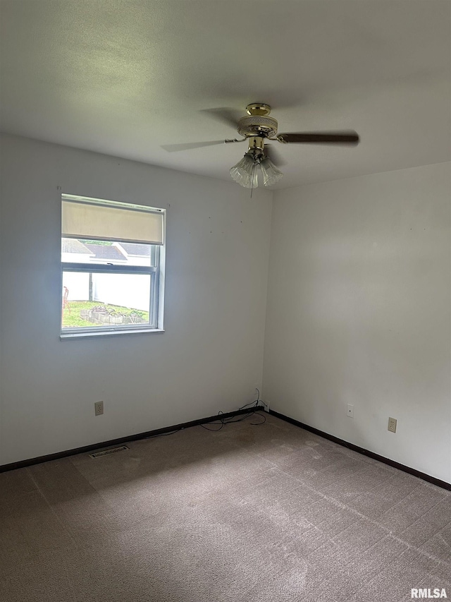 705 Terrace Dr, Duquoin, IL 62832 - carpeted empty room featuring ceiling fan and baseboards