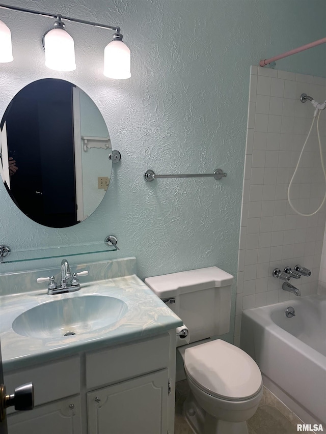 705 Terrace Dr, Duquoin, IL 62832 - bathroom with vanity, washtub / shower combination, toilet, and a textured wall