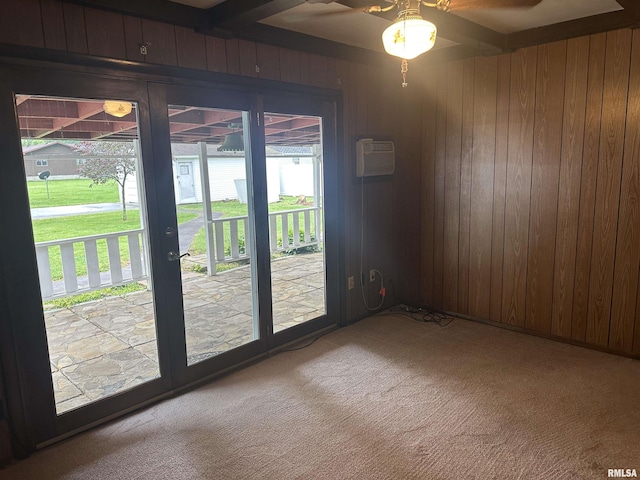 705 Terrace Dr, Duquoin, IL 62832 - carpeted spare room with wooden walls, ceiling fan, french doors, and a wall mounted air conditioner