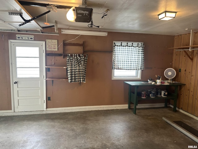 705 Terrace Dr, Duquoin, IL 62832 - garage with a garage door opener and baseboards