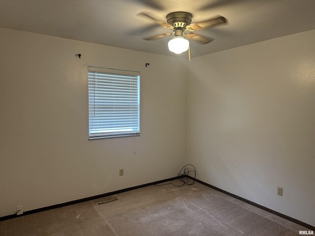 705 Terrace Dr, Duquoin, IL 62832 - unfurnished room featuring a ceiling fan, baseboards, and carpet