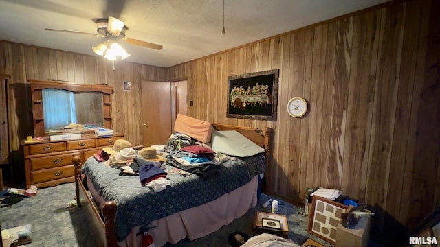 11218 Old Lake Rd, Benton, IL 62812 - bedroom featuring wooden walls, carpet, and a ceiling fan