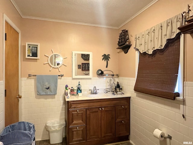 1011 W Goodall St, Marion, IL 62959 - bathroom with tile walls, vanity, wainscoting, crown molding, and toilet