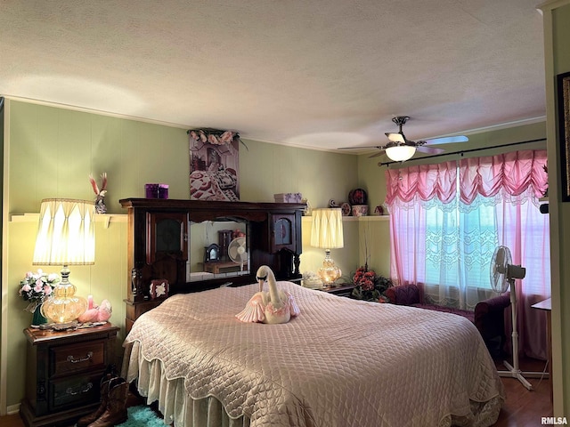 1011 W Goodall St, Marion, IL 62959 - bedroom with ceiling fan, a textured ceiling, ornamental molding, and wood finished floors