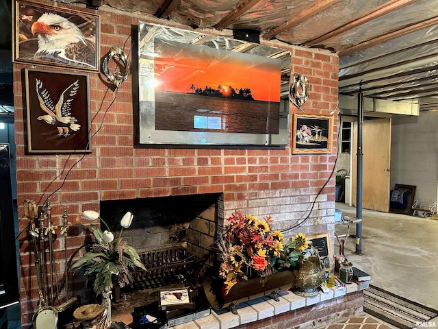 1011 W Goodall St, Marion, IL 62959 - detailed view of unfinished concrete floors and a brick fireplace