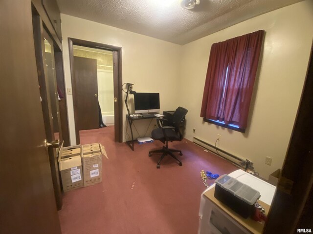 1010 E Main St, Benton, IL 62812 - carpeted office featuring baseboard heating and a textured ceiling
