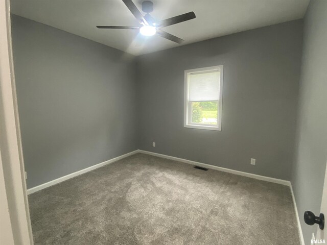 421 N 10th St, Benton, IL 62812 - spare room featuring carpet flooring, ceiling fan, and baseboards