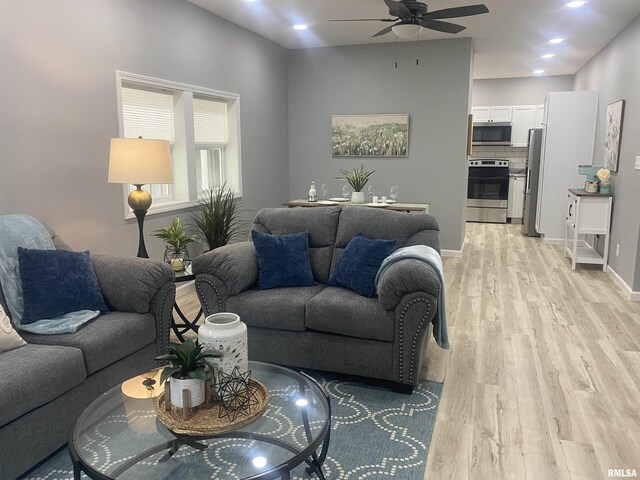 421 N 10th St, Benton, IL 62812 - living area with ceiling fan, light wood finished floors, recessed lighting, and baseboards