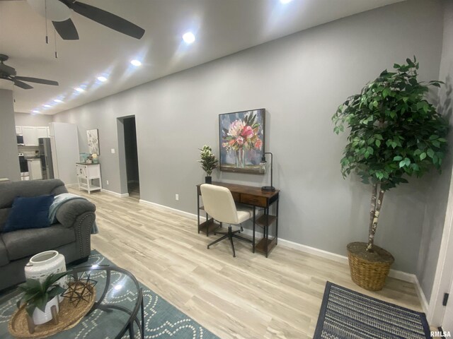421 N 10th St, Benton, IL 62812 - living room featuring a ceiling fan, light wood-type flooring, baseboards, and recessed lighting