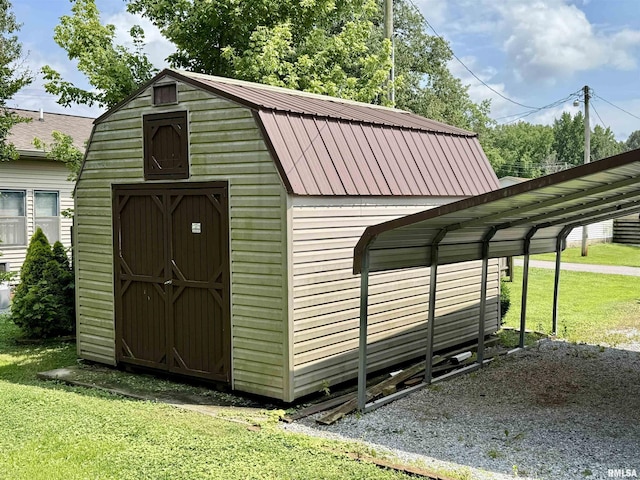 113 E 21st St, Metropolis, IL 62960 - view of shed featuring a carport