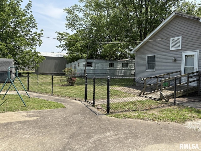 1606 W Faust St, Marion, IL 62959 - view of yard with a playground and a gate