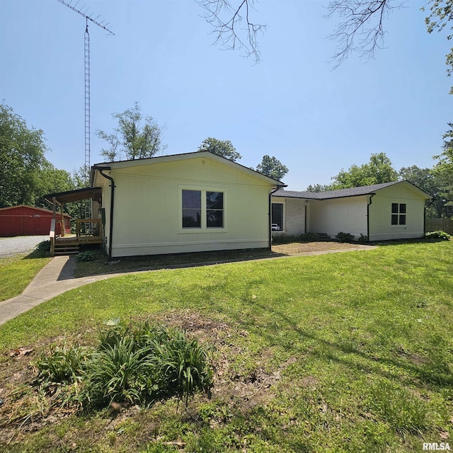 15074 N Mccauley Ln, Mount Vernon, IL 62864 - back of house with a lawn