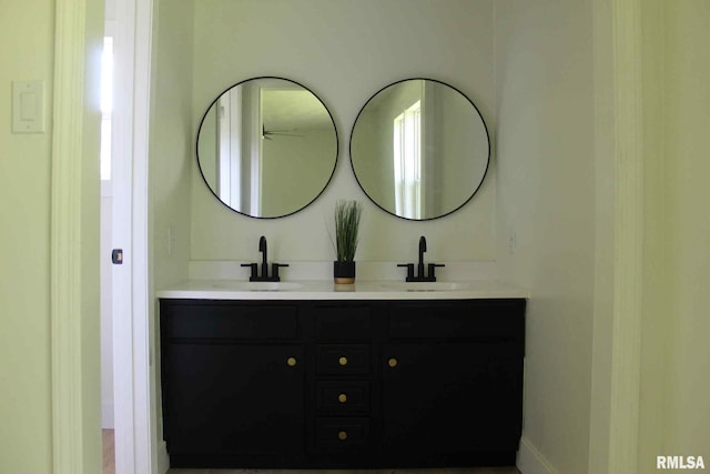 15074 N Mccauley Ln, Mount Vernon, IL 62864 - bathroom featuring double vanity and baseboards