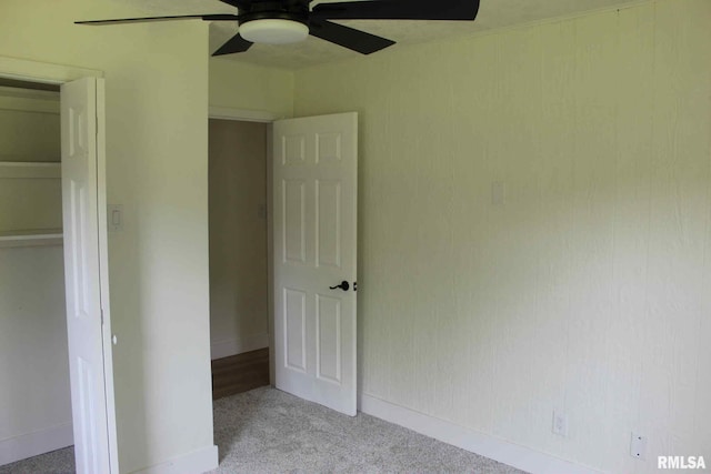 15074 N Mccauley Ln, Mount Vernon, IL 62864 - unfurnished bedroom with carpet, a ceiling fan, and baseboards