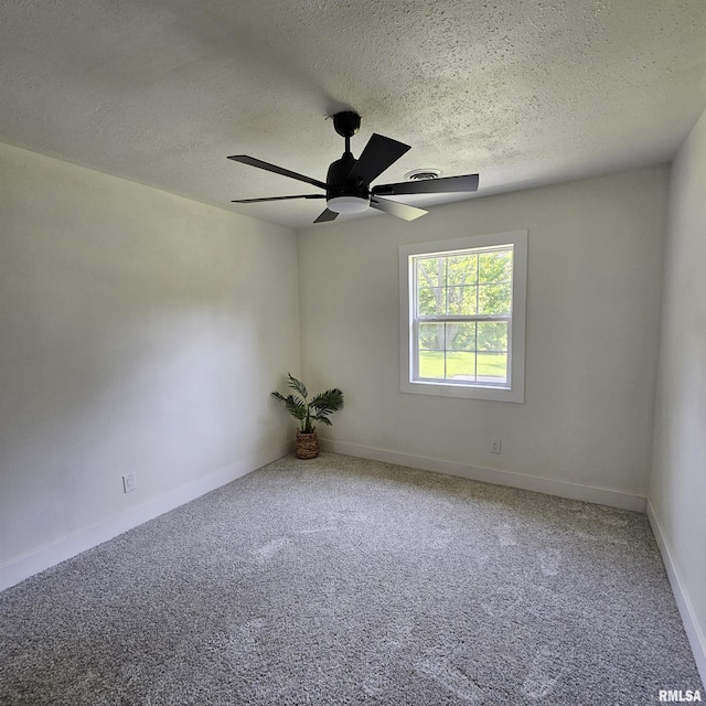 15074 N Mccauley Ln, Mount Vernon, IL 62864 - carpeted empty room featuring a ceiling fan, a textured ceiling, and baseboards