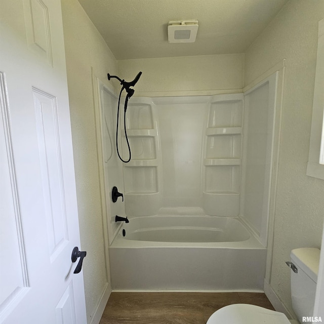 15074 N Mccauley Ln, Mount Vernon, IL 62864 - full bath with toilet, baseboards, wood finished floors, and  shower combination