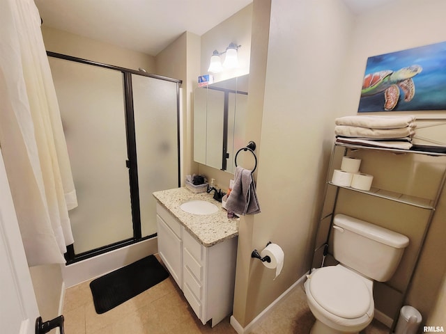 100 Stable Dr, Carterville, IL 62918 - bathroom featuring vanity, a shower stall, toilet, tile patterned floors, and baseboards