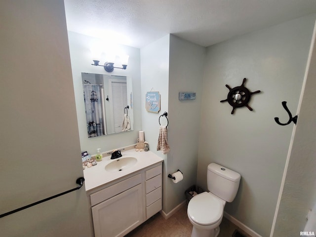 100 Stable Dr, Carterville, IL 62918 - bathroom with vanity, toilet, and baseboards