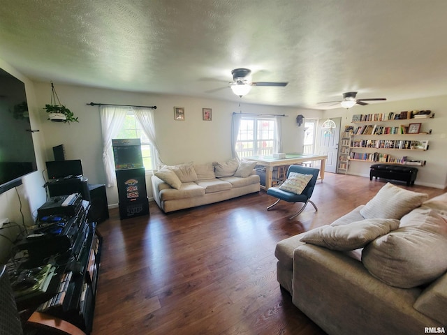 100 Stable Dr, Carterville, IL 62918 - living area featuring a ceiling fan, wood finished floors, and a textured ceiling