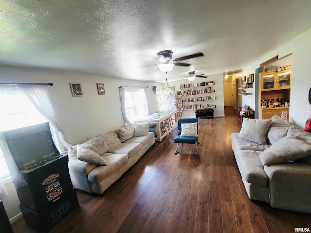 100 Stable Dr, Carterville, IL 62918 - living area featuring wood finished floors, a ceiling fan, and a textured ceiling