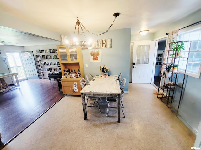 100 Stable Dr, Carterville, IL 62918 - dining area featuring a chandelier and light flooring