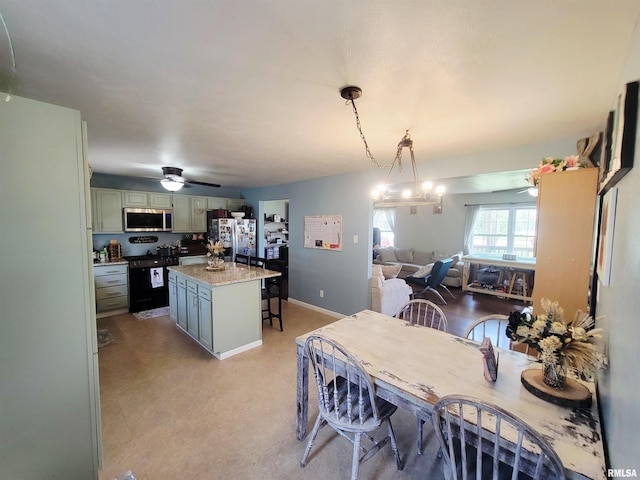 100 Stable Dr, Carterville, IL 62918 - dining area featuring ceiling fan and baseboards