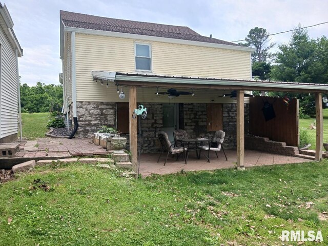 2623 Kk Rd, Waterloo, IL 62298 - back of property featuring a ceiling fan, a patio, and a yard