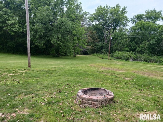 2623 Kk Rd, Waterloo, IL 62298 - view of green lawn featuring a fire pit